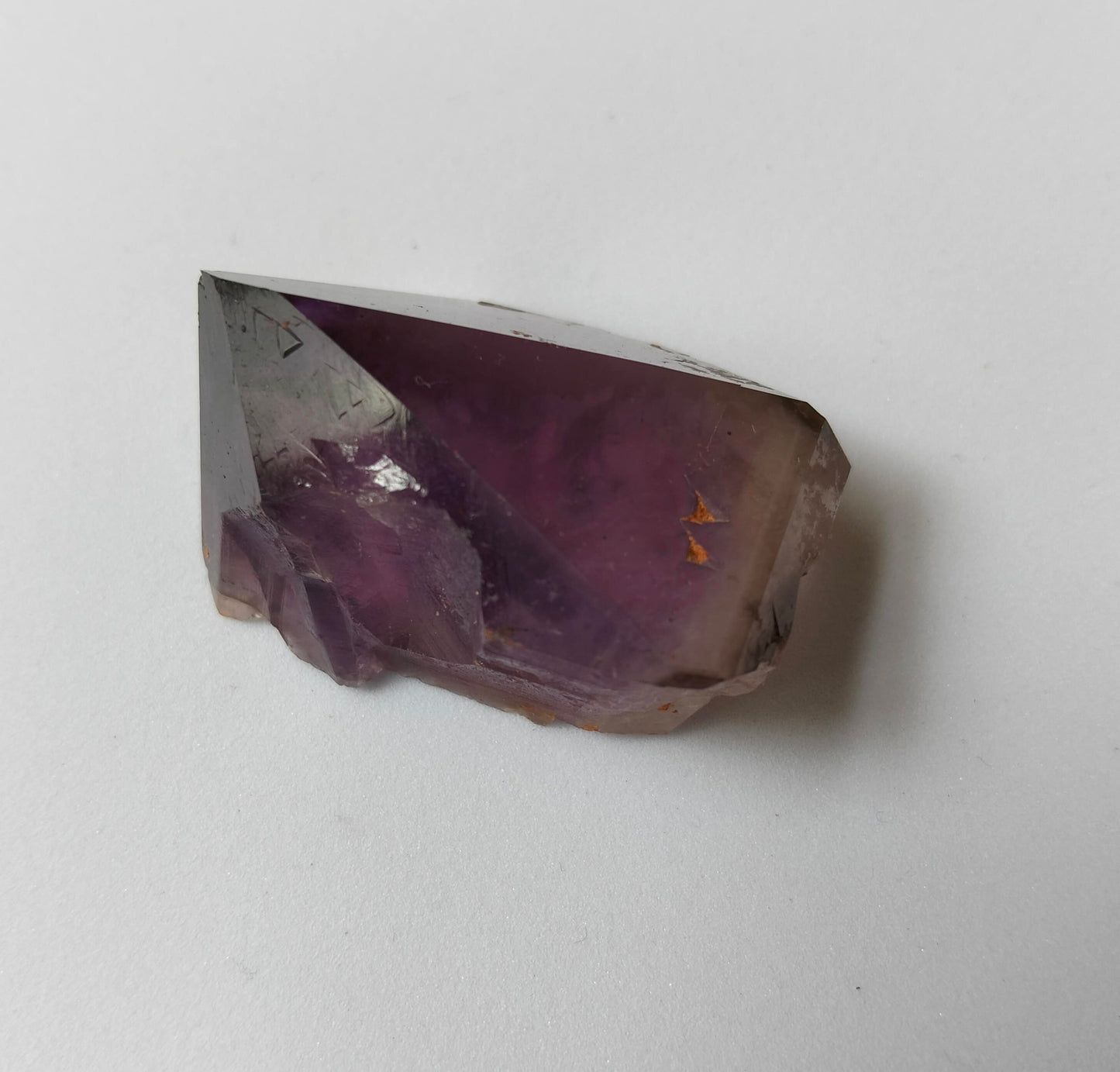 amethyst crystal, adorned with inclusions and zoning of amethyst, showcase the unique geological processes at play. Unearthed from this distinctive Australian mine, each amethyst point holds a piece of history and inherent beauty.