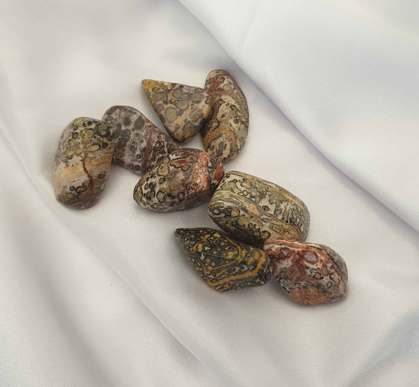 Also known as the Jaguar Stone. A Native American legend says that Leopardskin Jasper was created to be a bridge to the deepest mysteries, honouring the dark and assisting you in fulfilling karmic agreements. A leopard skin Jasper tumbled stone can help with stability and serenity during times of stress and anxiety, it can assist in guarding from negative energies, and once attuned to it, it can help keep peaceful vibrations.