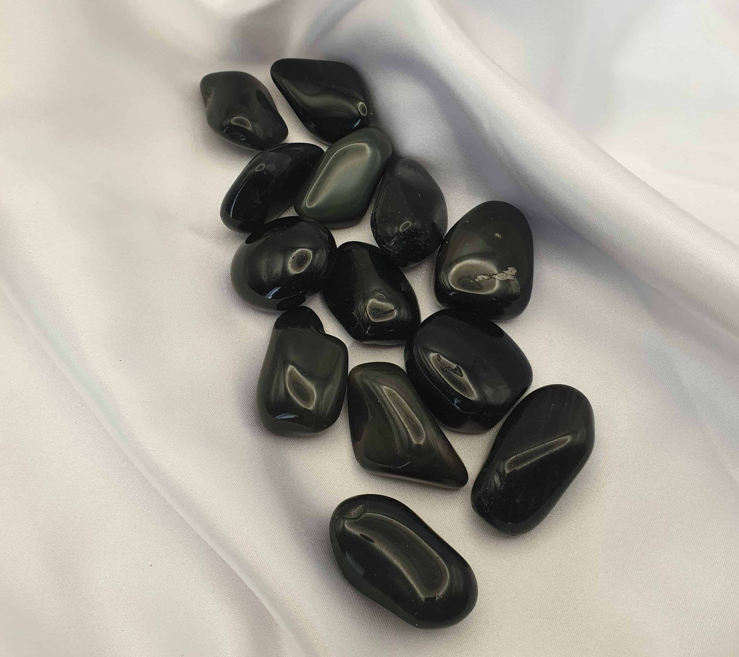 Rainbow Obsidian is said to be one of the more gentler of the obsidians but still with very strong protective properties. It can help to cut chords of old love, gently releasing the hooks that others have in the heart and helping to replenish heart energy. As it is another black stone, it can be a great absorber of negative energy.