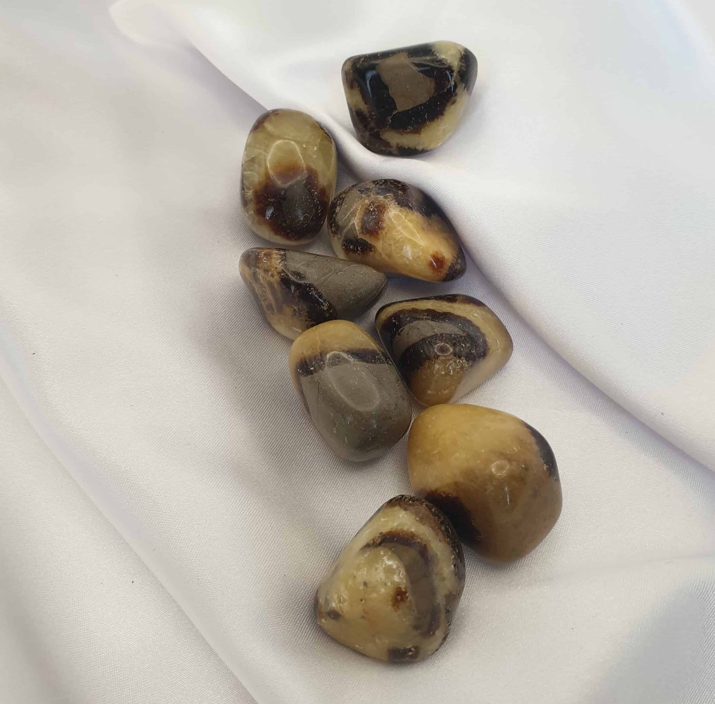 Known as the Dragon Stone, as it brings courage, it also aids in tolerance, patience and emotional stability and was carried in history to bestow confidence. Carrying a septarian tumbled stone in your pocket can be a great help for public speaking. Septarian brings about calm by connecting with nature and natural energies.