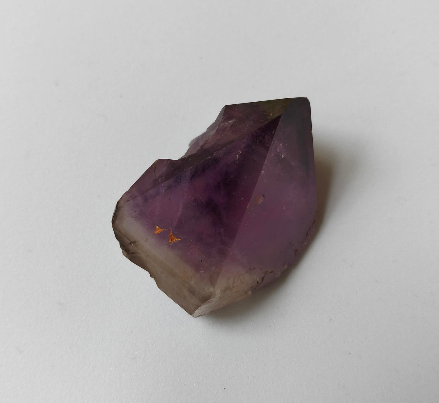 amethyst crystal, adorned with inclusions and zoning of amethyst, showcase the unique geological processes at play. Unearthed from this distinctive Australian mine, each amethyst point holds a piece of history and inherent beauty.