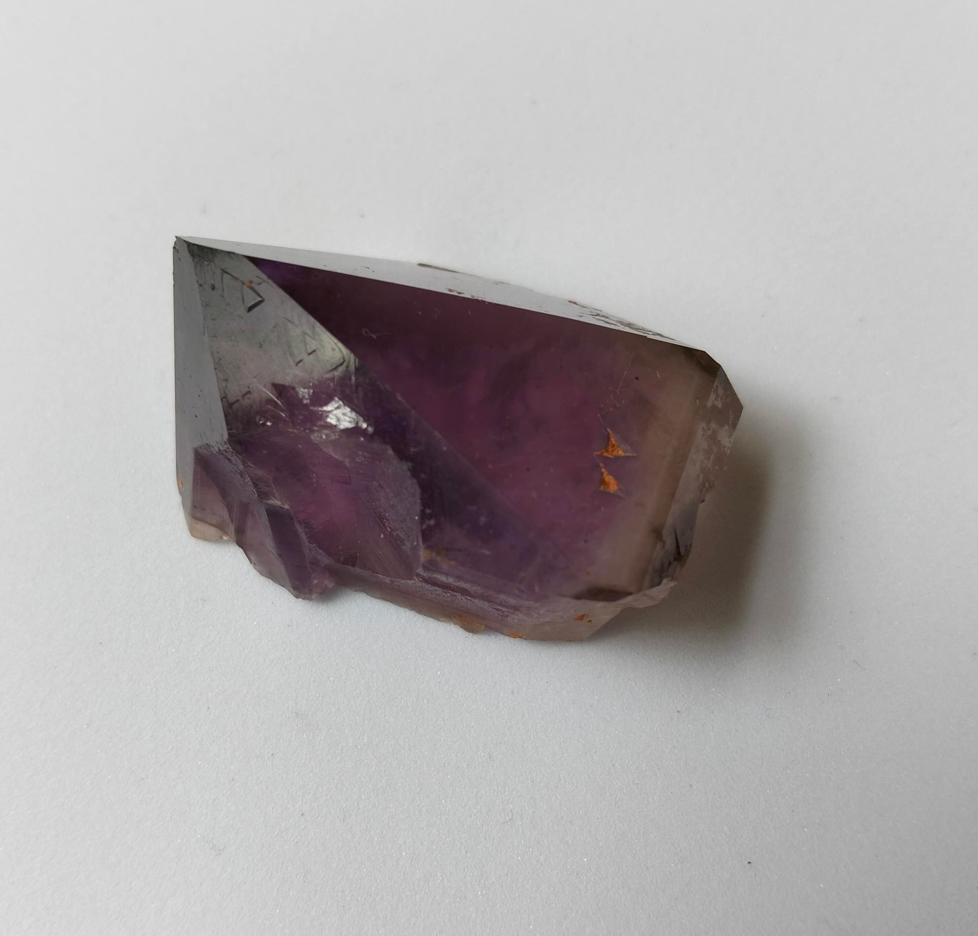 amethyst crystal, adorned with inclusions and zoning of amethyst, showcase the unique geological processes at play. Unearthed from this distinctive Australian mine, each amethyst point holds a piece of history and inherent beauty.