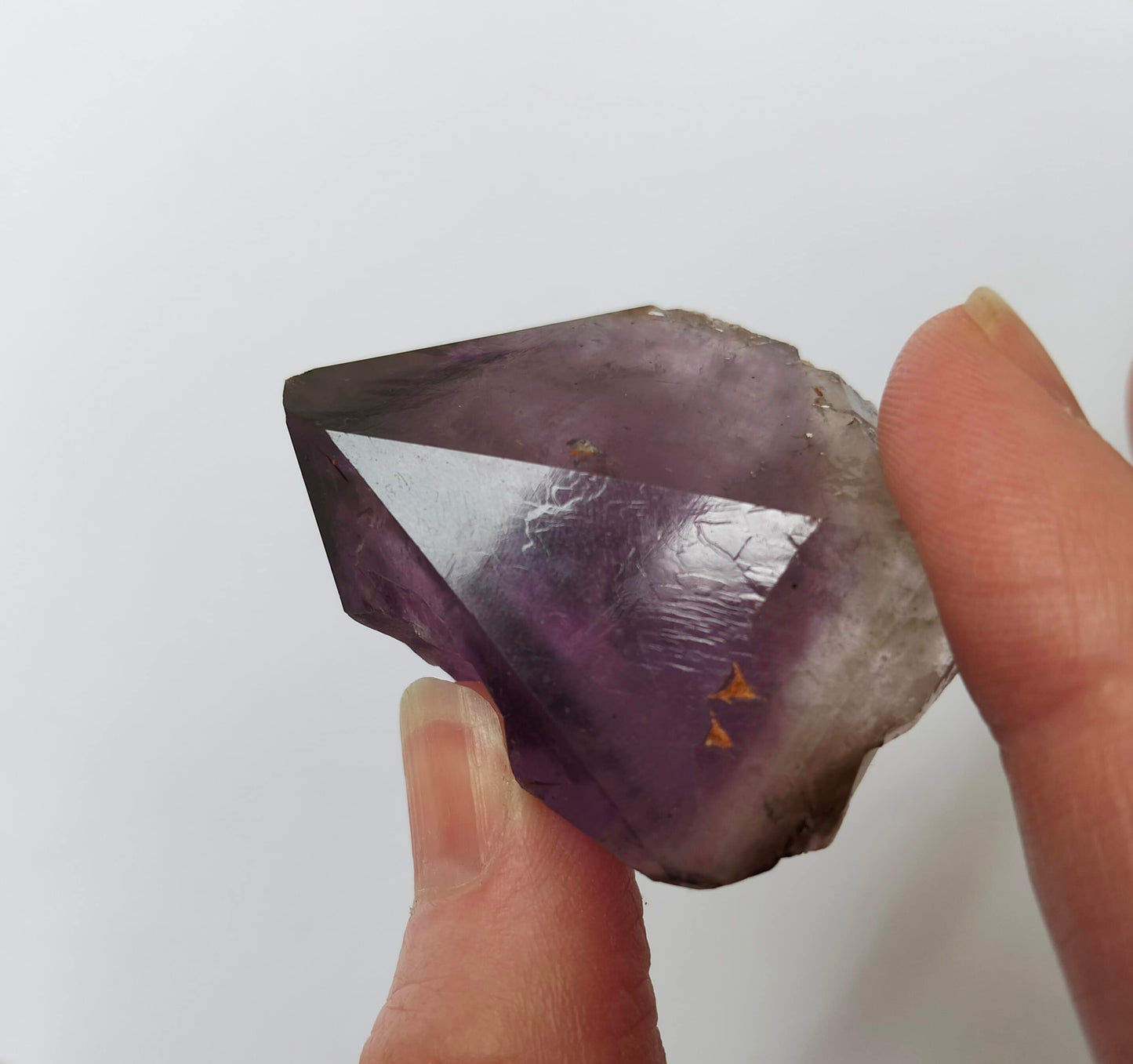 amethyst crystal, adorned with inclusions and zoning of amethyst, showcase the unique geological processes at play. Unearthed from this distinctive Australian mine, each amethyst point holds a piece of history and inherent beauty.
