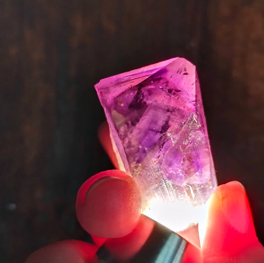 amethyst crystal, adorned with inclusions and zoning of amethyst, showcase the unique geological processes at play. Unearthed from this distinctive Australian mine, each amethyst point holds a piece of history and inherent beauty.