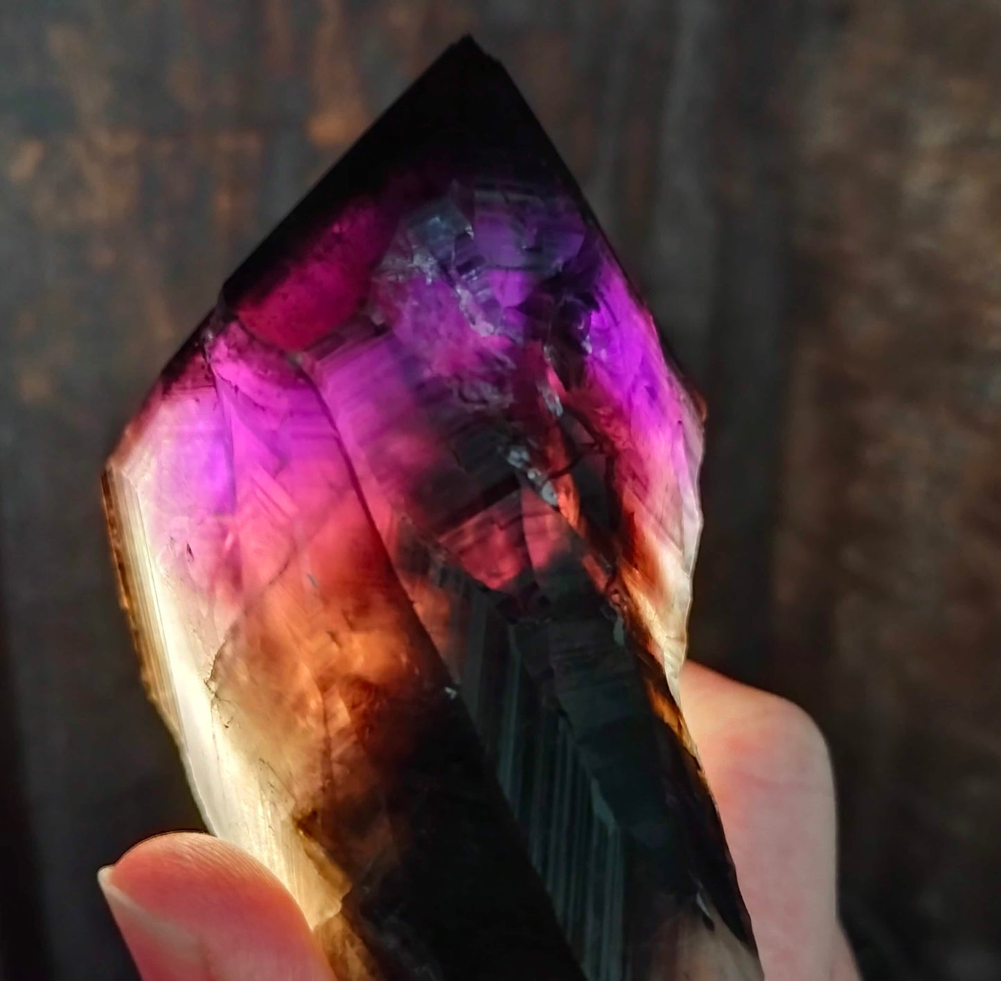 amethyst crystal, adorned with inclusions and zoning of smoky quartz and amethyst, showcase the unique geological processes at play. Unearthed from this distinctive Australian mine, each amethyst point holds a piece of history and inherent beauty.