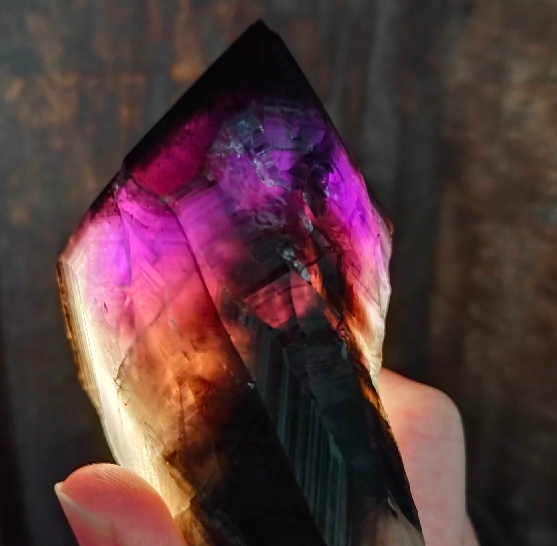 amethyst crystal, adorned with inclusions and zoning of smoky quartz and amethyst, showcase the unique geological processes at play. Unearthed from this distinctive Australian mine, each amethyst point holds a piece of history and inherent beauty.