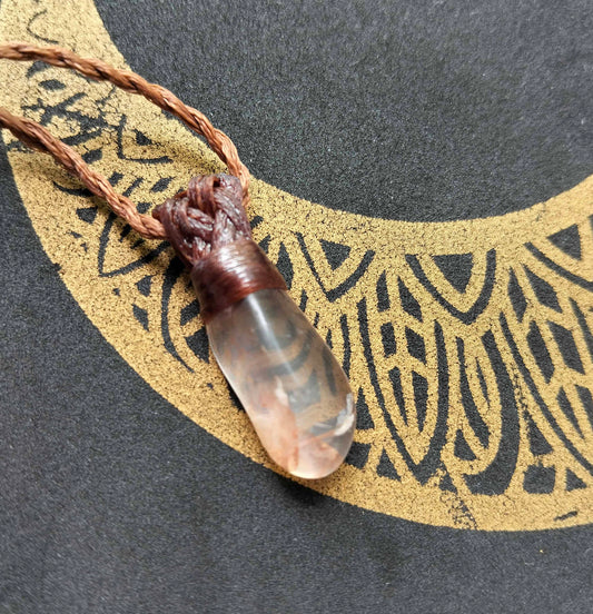 This Australian Pink Petalite Stone pendant Necklace is hand made with love by Byron Bay Artisan, Figwickle. Necklace is a hand twisted leather stitching chord.