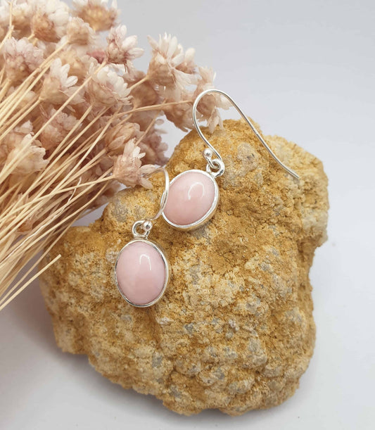These Pink Opal earrings are the most beautiful blush pink colour, really delicate and light to wear. Wearing pink opal can assist with bringing peace to the heart, calm and tranquility.   Gemstone is approximately  11mm x 9mm Handcrafted in India using 925 sterling silver