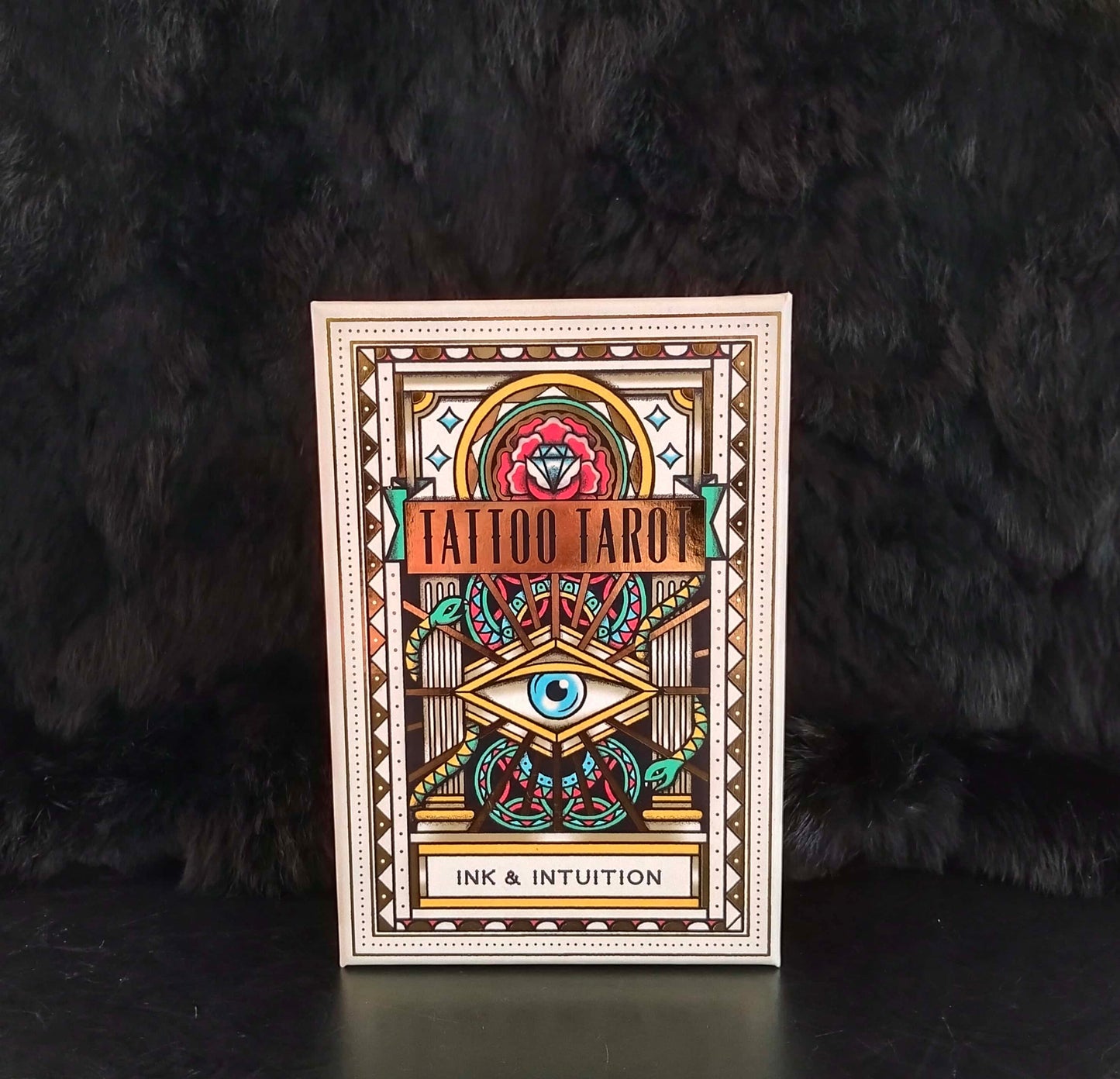 A beautifully packaged and vibrantly illustrated Tarot Deck, reimagined by contemporary illustrator and tattoo artist Megamunden