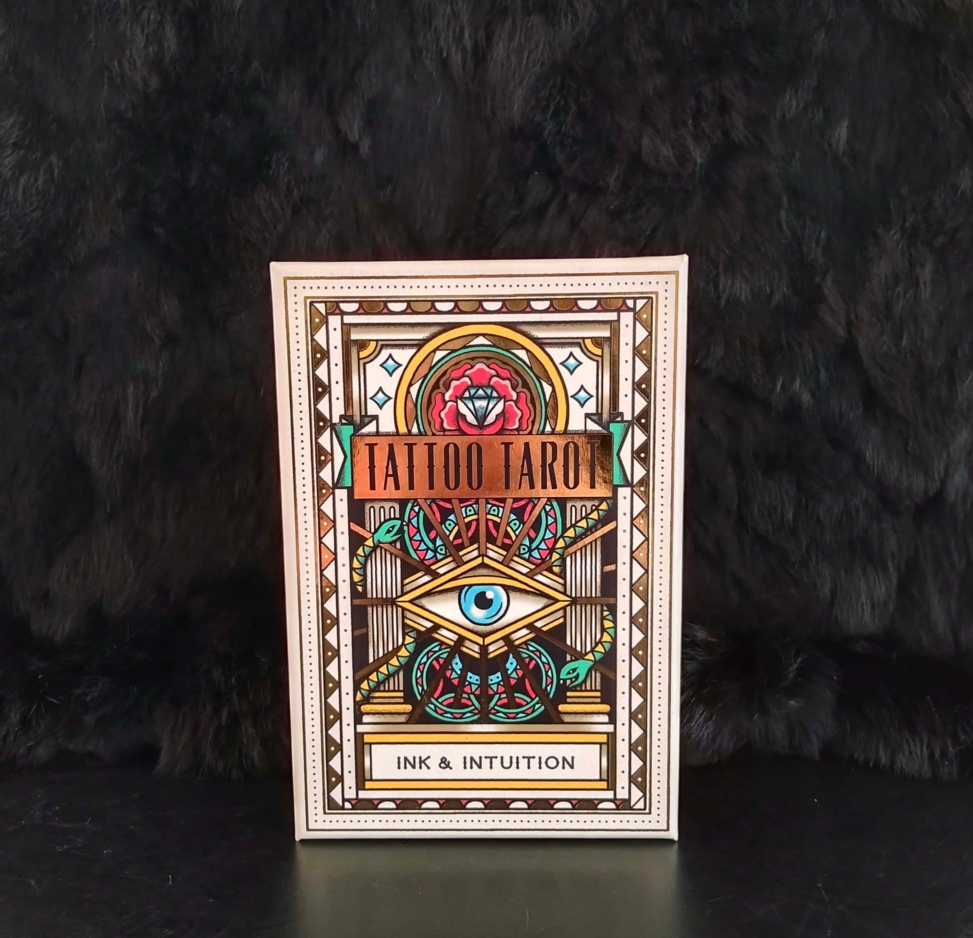 A beautifully packaged and vibrantly illustrated Tarot Deck, reimagined by contemporary illustrator and tattoo artist Megamunden