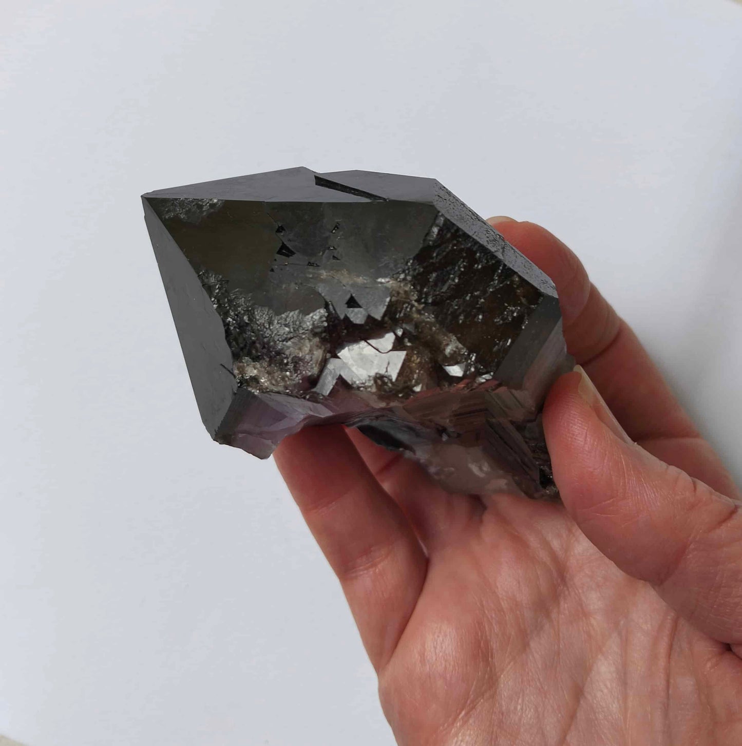 amethyst crystal, adorned with inclusions and zoning of smoky quartz and amethyst, showcase the unique geological processes at play. Unearthed from this distinctive Australian mine, each amethyst point holds a piece of history and inherent beauty.