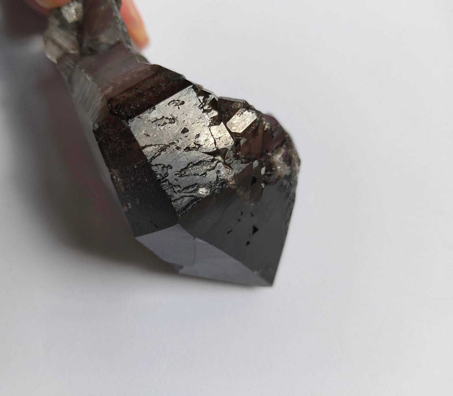 amethyst crystal, adorned with inclusions and zoning of smoky quartz and amethyst, showcase the unique geological processes at play. Unearthed from this distinctive Australian mine, each amethyst point holds a piece of history and inherent beauty.