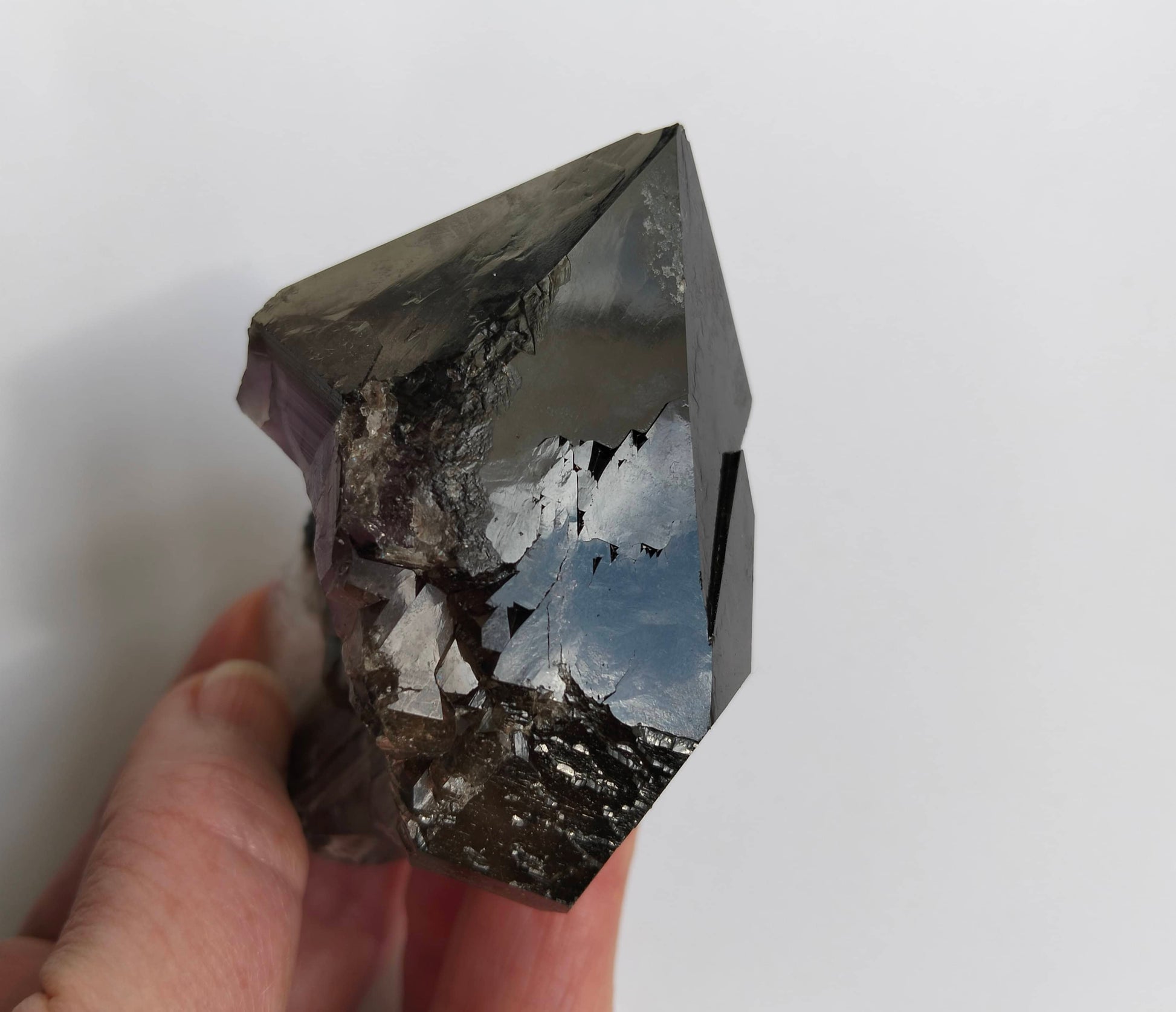 amethyst crystal, adorned with inclusions and zoning of smoky quartz and amethyst, showcase the unique geological processes at play. Unearthed from this distinctive Australian mine, each amethyst point holds a piece of history and inherent beauty.