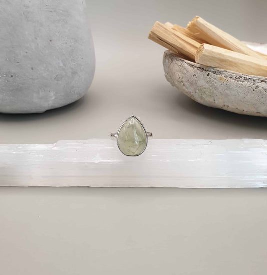 Prehnite is said to be a stone of unconditional love and the crystal that heals the healer. It can teach us how to be in harmony with nature and the elemental forces, revitalising and renewing surroundings.  Handcrafted in India using 925 sterling silver