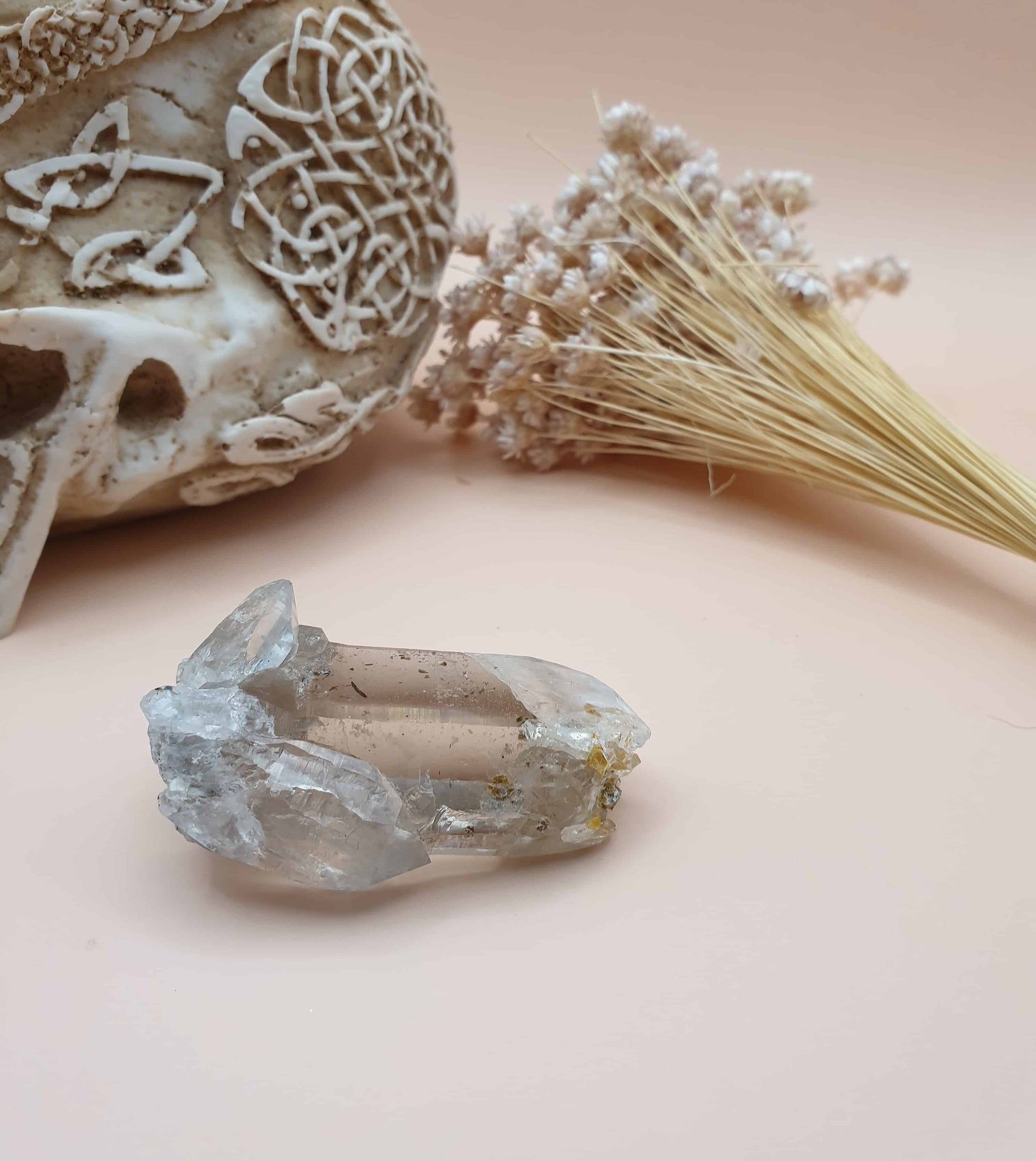 This stunning Ganesh Himal quartz natural point is hand mined by sherpas from the holy mountain Ganesh! This piece has beautiful mica inclusions. Mica is a principle rock forming mineral, that often has a shimmer and forms in layers.