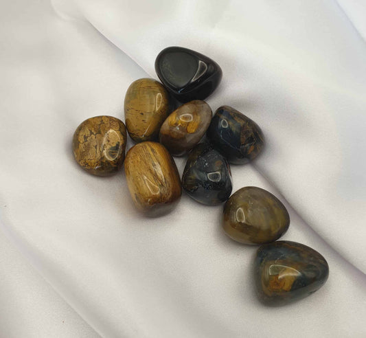 Tigrina (nellite) is a combination of Blue Gold Tiger Eye and Pietersite infusing the creative energy of tiger eye and the intuitiveness of peitersite making this a very grounding stone. Can be an excellent stone for acceptance, Tigrina can provide support when facing times of uncertainty, it can also improve creativity and promote clear thoughts. Also known as the honey stone.