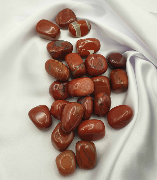 Red Jasper can provide grounding energy, harmonising physical, intellectual and emotional energies. Red Jasper tumbled stones can be great for calming emotion and placed under a pillow they can promote dream recall. Known as the 'stone of protection' it is appreciated in many cultures and balances the yin-yang energies.